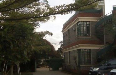 Harlequins Suites Hotel