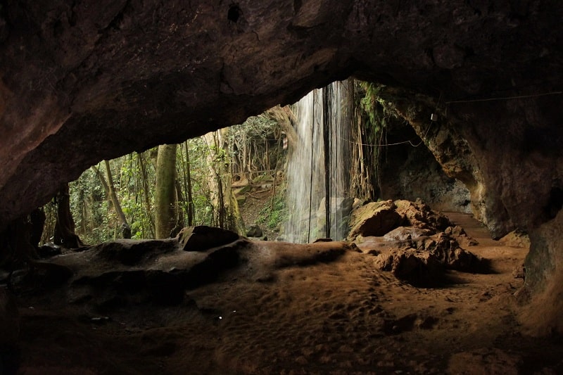 inside a cave, there's a waterfall, menengai caves